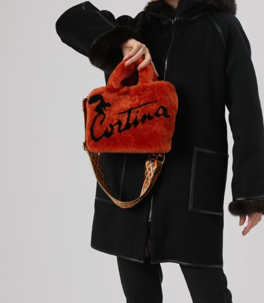 25/26 Borsa in shearling epilato colore arancione scuro